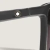 Lunettes de soleil carrées à monture noire injectée