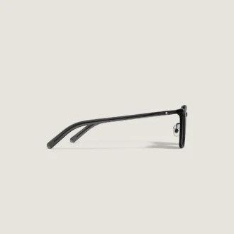 Lunettes de soleil ovales avec monture en acétate noir