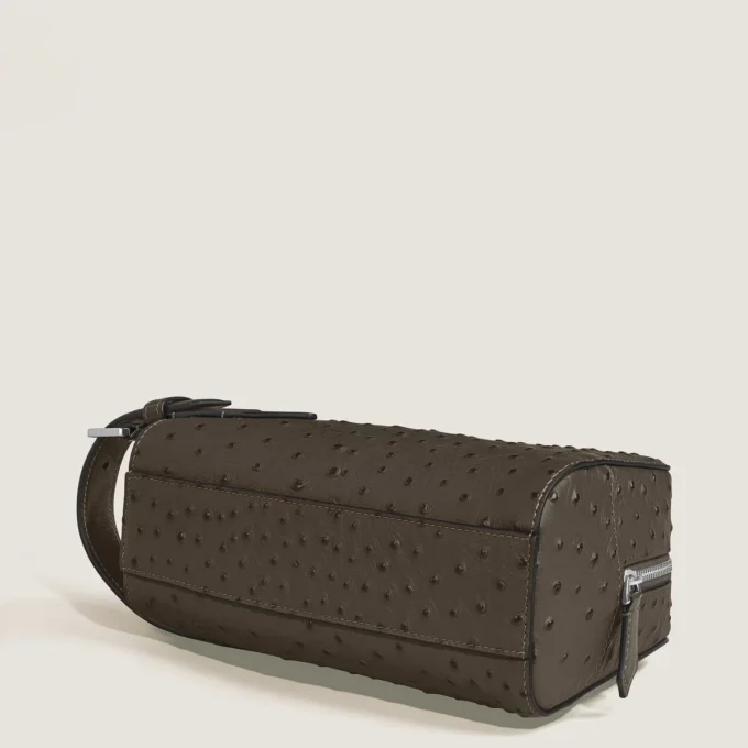 Pochette de toilette en cuir gaufré autruche Pochette de toilette en cuir gaufré autruche